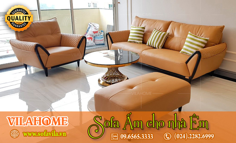 Sofa da dạng văng cao cấp Vilahome có màu cam làm căn phòng trở nên có sức sống